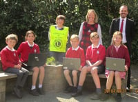 Binsted pupils get laptops from Lions