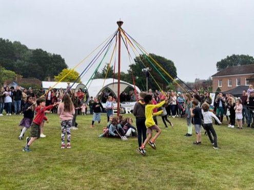 Maypole dancing at Chiddingfold’s Platinum Jubilee celebrations