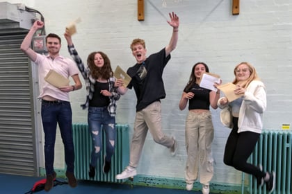 Amery Hill School staff and trustees congratulate GCSE pupils