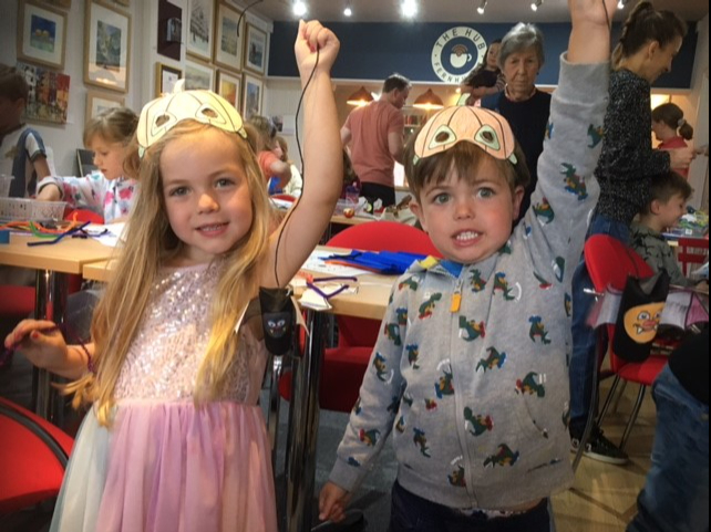 Twins Violet and Arthur Berry show off their crafts at the Fernhurst Hub’s Hallowe’en event