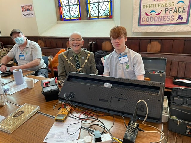 The mayor of Farnham at last month's Farnham Repair Cafe session with a 15 year old volunteer repairer whose dream is to become an aeronautical engineer