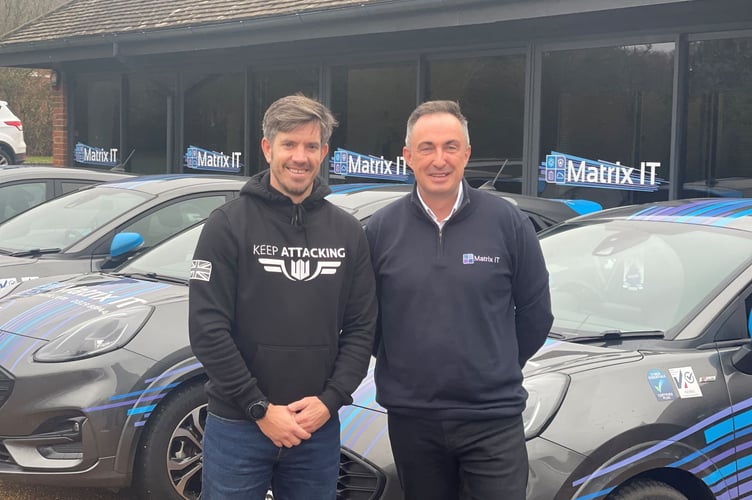 Nic Cronin, managing director of Matrix (right), got to know Whitehill veteran Brian Wood (left) through their love of Portsmouth FC