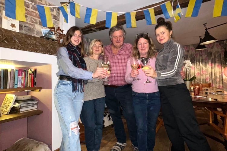 Khrystyna Kovalevska and her sponsor family celebrate the deoccupation of the Ukrainian city Kherson