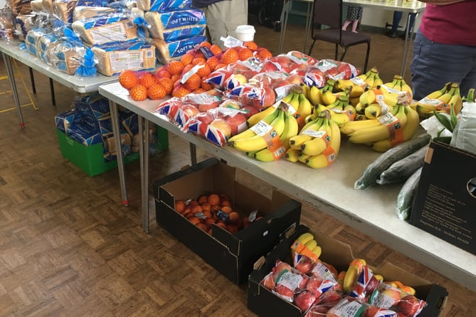 Food laid out for free picnic lunch bags at Brambleton Hall