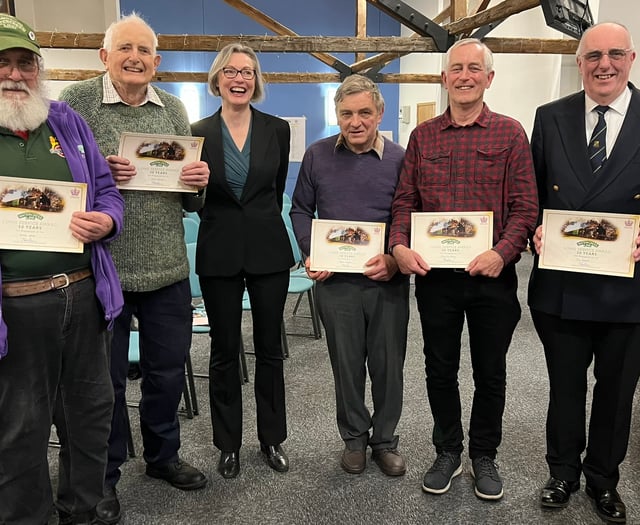 Watercress Line gives certificates for 50 years of volunteering