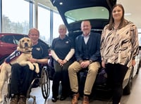 Dealership welcomes driving force behind East Hampshire canine charity