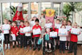 Garden centres in Frensham and Badshot Lea harvest pupils' potatoes