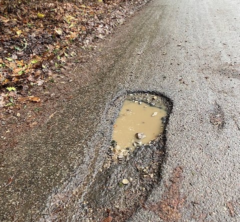 Scotland Lane road appears damaged thanks to traffic caused by the development