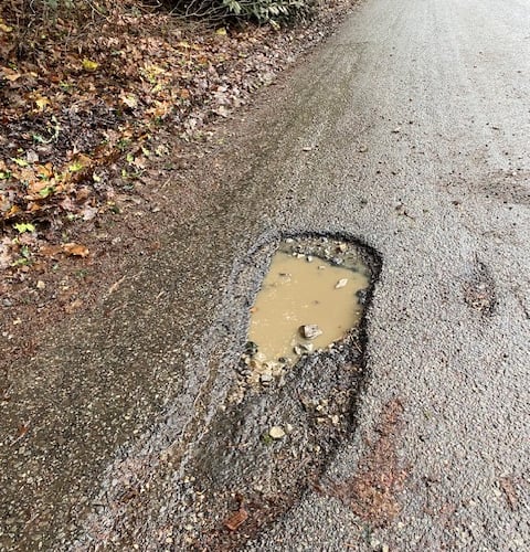 Scotland Lane road appears damaged thanks to traffic caused by the development