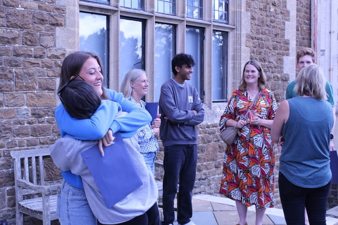 Hugs as students open their A-Level results at the Royal School