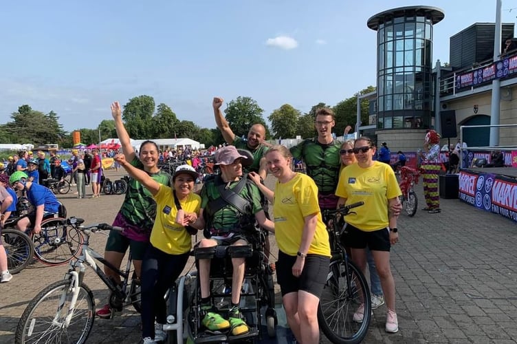 Hero Sam with his sidekick team, Sarah Pham, Nicholas Bourne, Tomas Turpin, Hayley Rabson and Ruth Clark