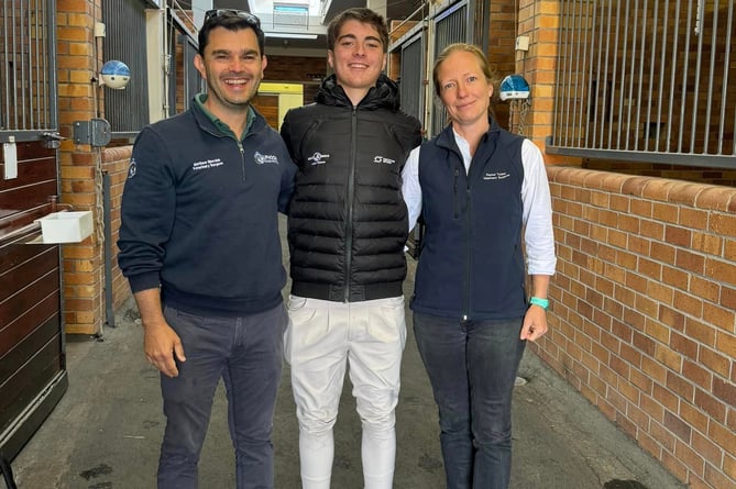 Liphook Equine Hospital vets Matthew Sinovich (left) and Rachel Tucker with Luca Watson